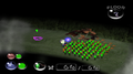 Louie and a squad of Green Pikmin in Acid Cave. This version of the game has the visible fog of war enabled.